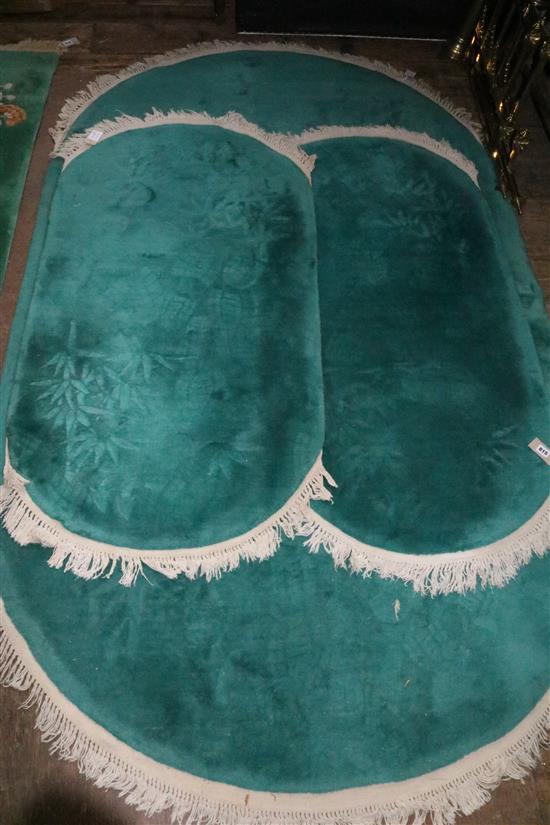 3 various Chinese green ground rugs(-)